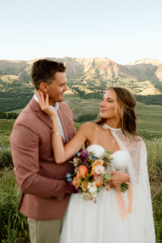 A Crested Butte wedding is held in a meadow.