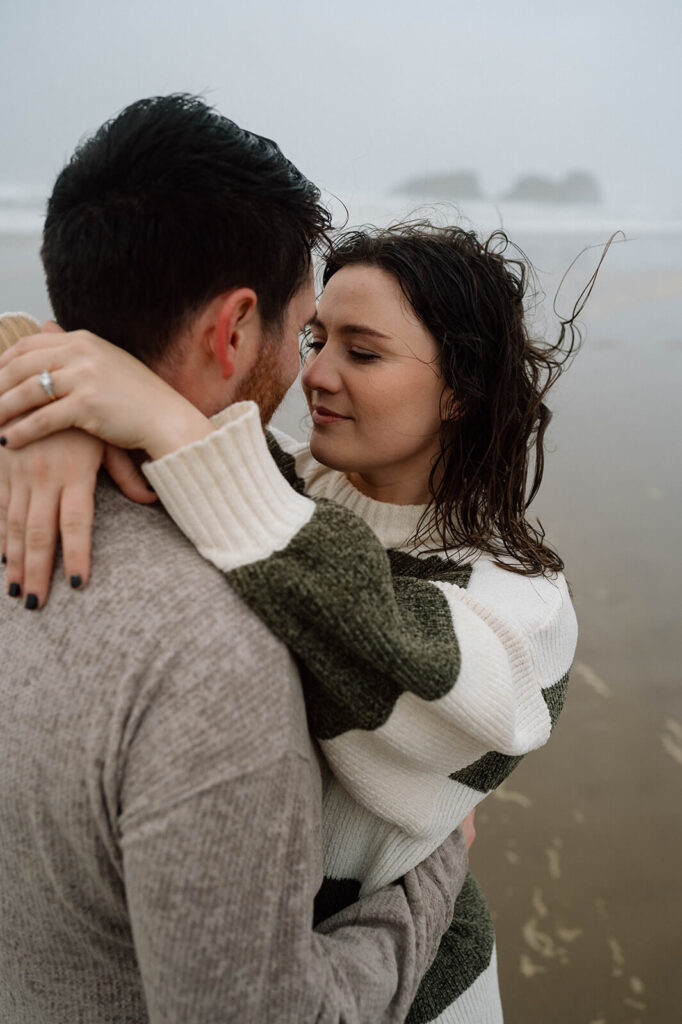 A couple embraces during their Oregon engagement session. 