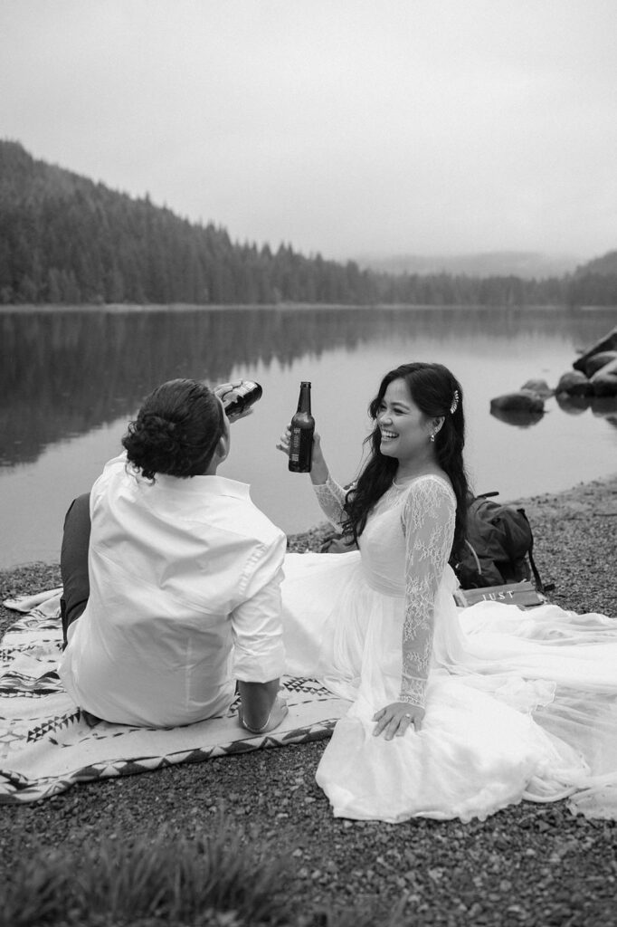 A couple shares beers at Trillium Lake.