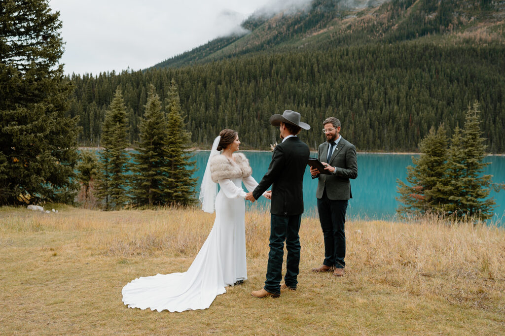 Cole from Married By Cole officiants a Banff elopement with a couple at Lake Louise. 