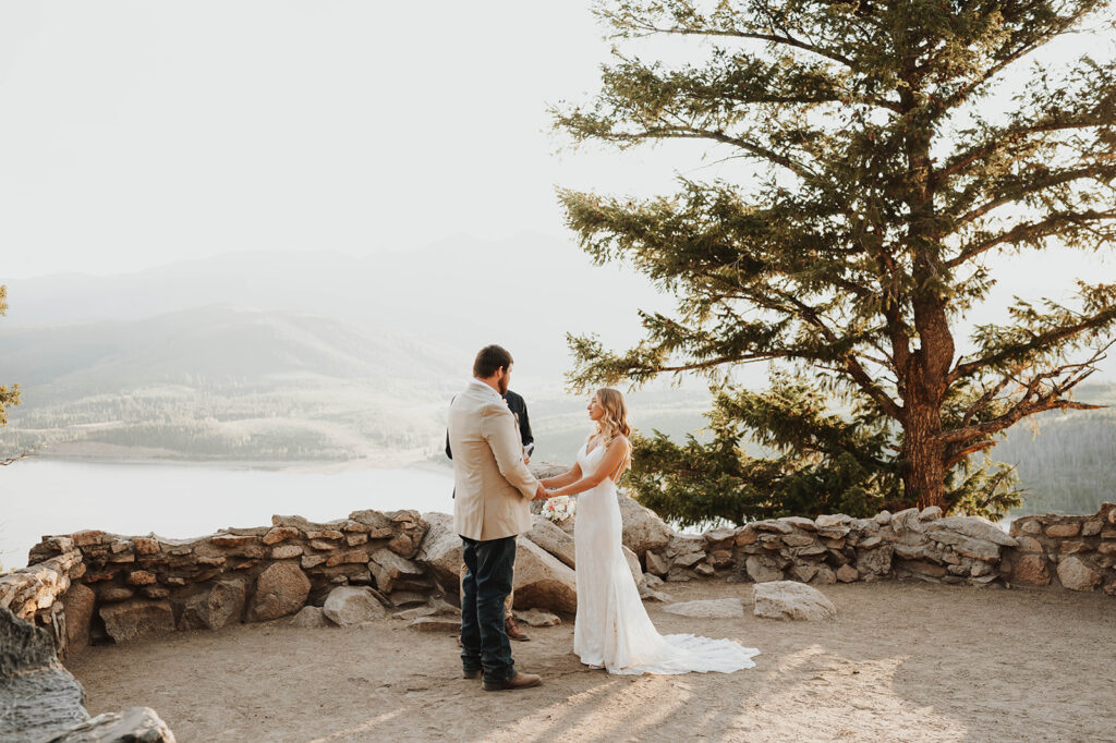 A bride and groom elope with family and friends at Sapphire Point Overlook. 